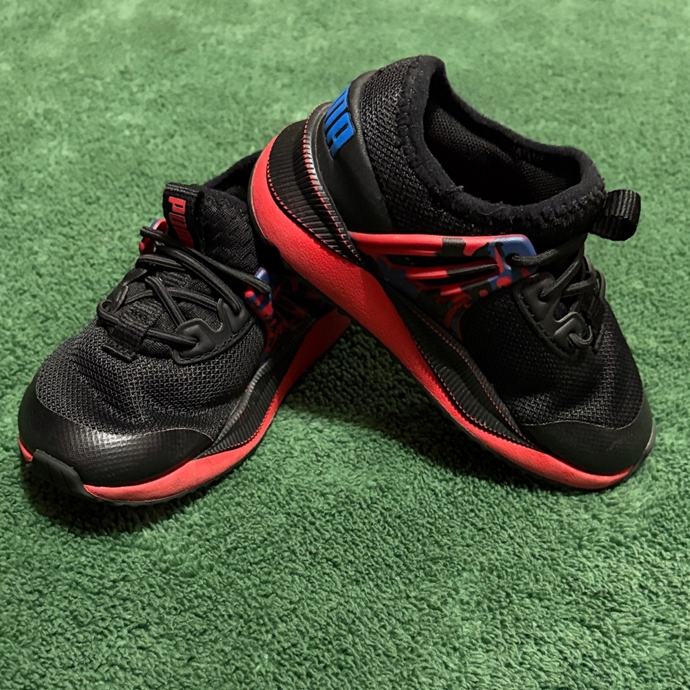Puma Kids Black and Red Sneakers with Blue Accents